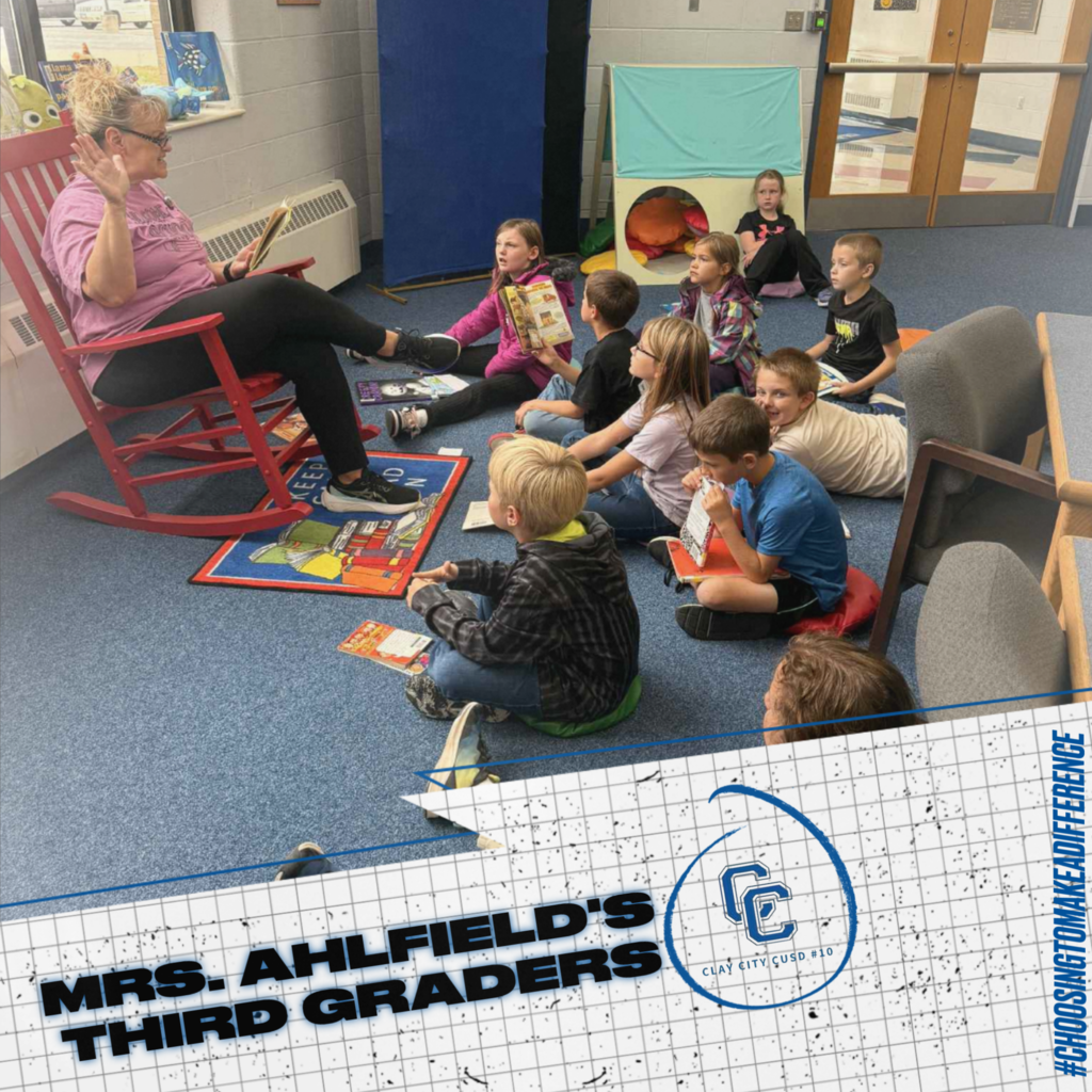 After Mrs. Ahlfield's third graders checked out their library books, she had them gather around and read a chapter of a book to them. The students enjoy this time and is a great method to introduce them to new materials!