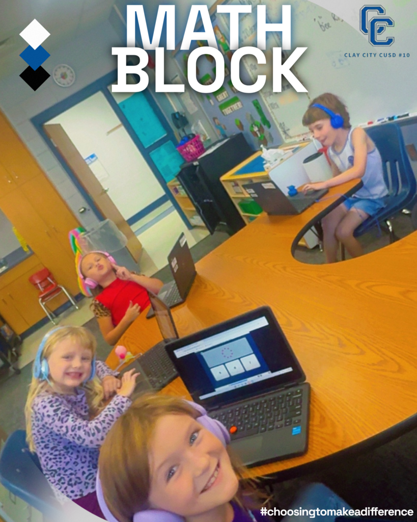 Mrs. Neubaum works with first graders Kaisley, Bella, Adalyn, and Oliver on i-Ready Math!