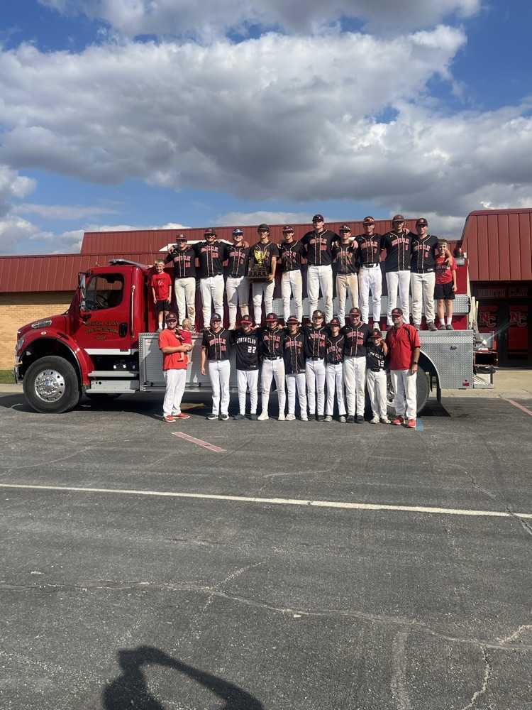 NC/CC HS Baseball Co-op CC teammates freshman James O'Dell, senior Cayden Craig, and freshman Chase Bangert take a moment to pose with their NTC Baseball Championship trophy. They also strike a smile with the rest of the NC/CC HS Baseball team!