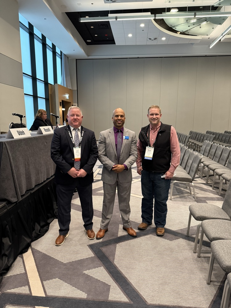 Mr Neubaum and Dusty Thompson in Chicago at the IL School Board Conference