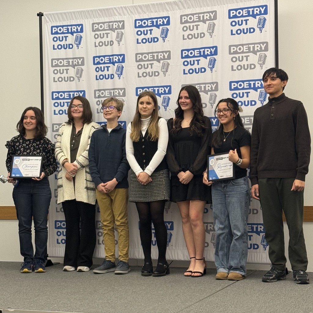 CCHS junior Alyssa G. competed in a poetry recitation competition for Poetry Out Loud on Thursday in Champaign at the Champaign Public Library. While she didn’t move on to the state competition, English teacher Hailey Martin stated she did really well! She recited “It Was Not Fate” by William H. A. Moore and “Mountain Storm” by Younghill Kang. Congratulations Alyssa, we at CCHS are proud of you! Here, Alyssa (second from left) stands with other contestants as they are recognized.