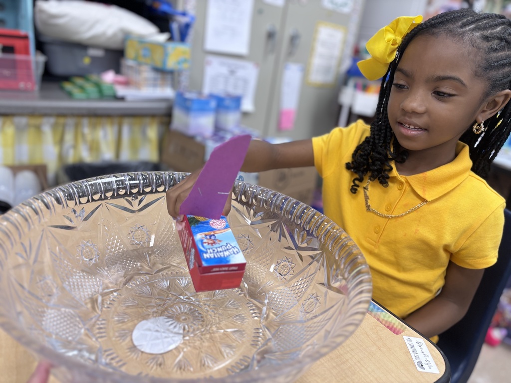 Kindergarteners learning about the concepts of sink and float.
