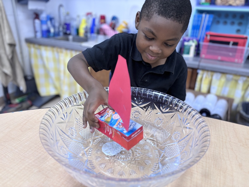 Kindergarteners learning about the concepts of sink and float.