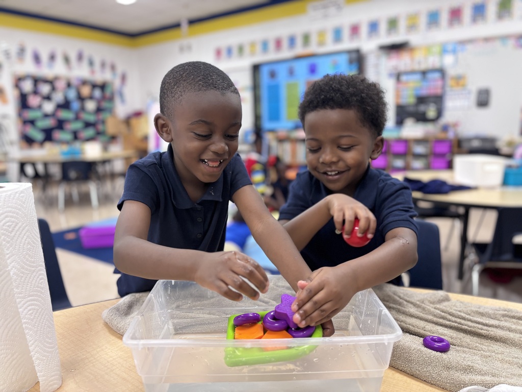 Kindergarteners learning about the concepts of sink and float.