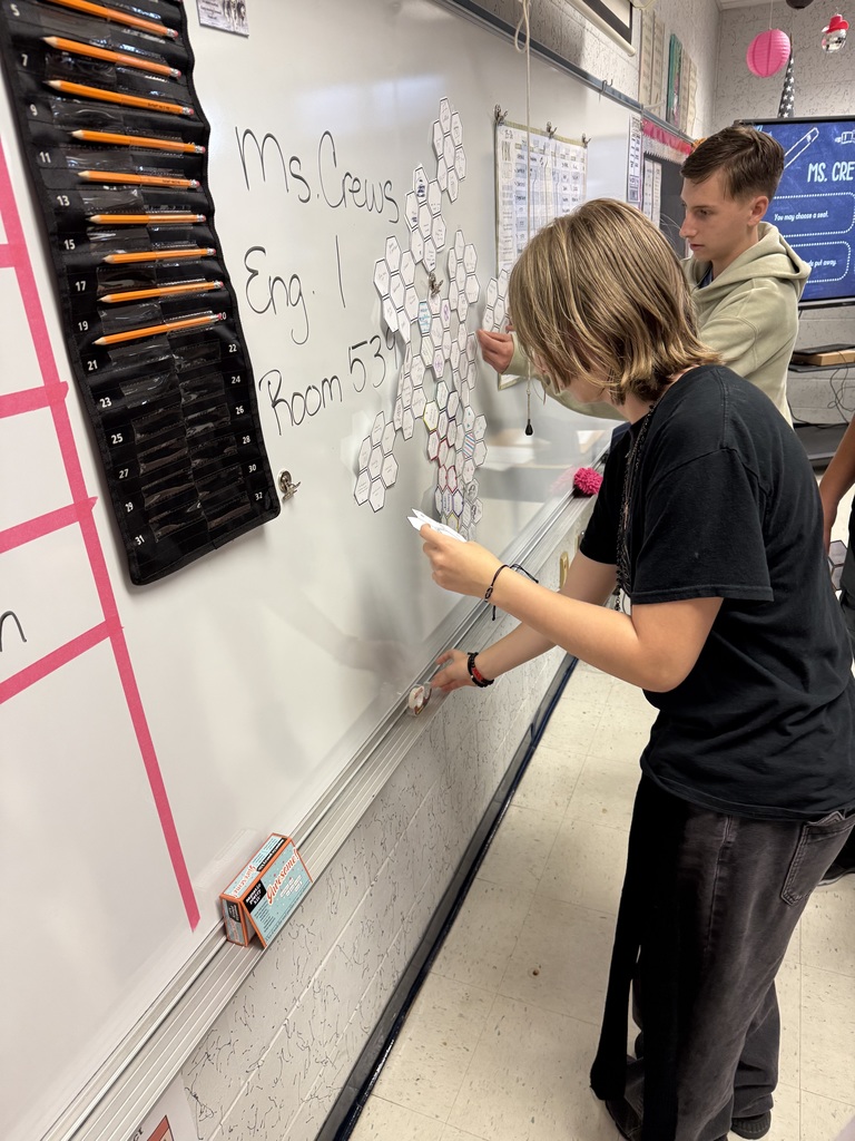 In Ms. Crews’s and Ms. Dupont’s 9th Grade English classes, students started the year by discovering what connects them! 📝✨ Using paper hexagons, each student shared personal interests, hobbies, and passions. Then, they linked their hexagons together to show the connections they have with their classmates. The growing web of hexagons became a visual reminder that—even in a new class—there’s always common ground and shared experiences. A creative and meaningful way to build community from day one!