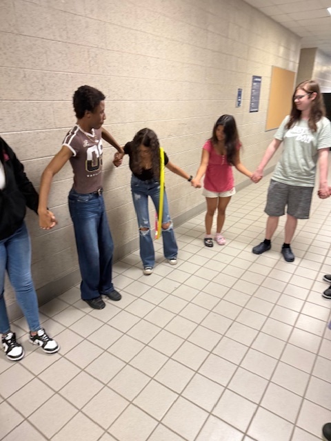 Ms. LaPierre’s class, students took on a fun teamwork challenge! 🤝 Working in a circle and holding hands, they had to pass a hula hoop all the way around without breaking the chain. The activity required communication, problem-solving, and cooperation. Afterwards, the class reflected on how teamwork is essential—both in the kitchen and in life.