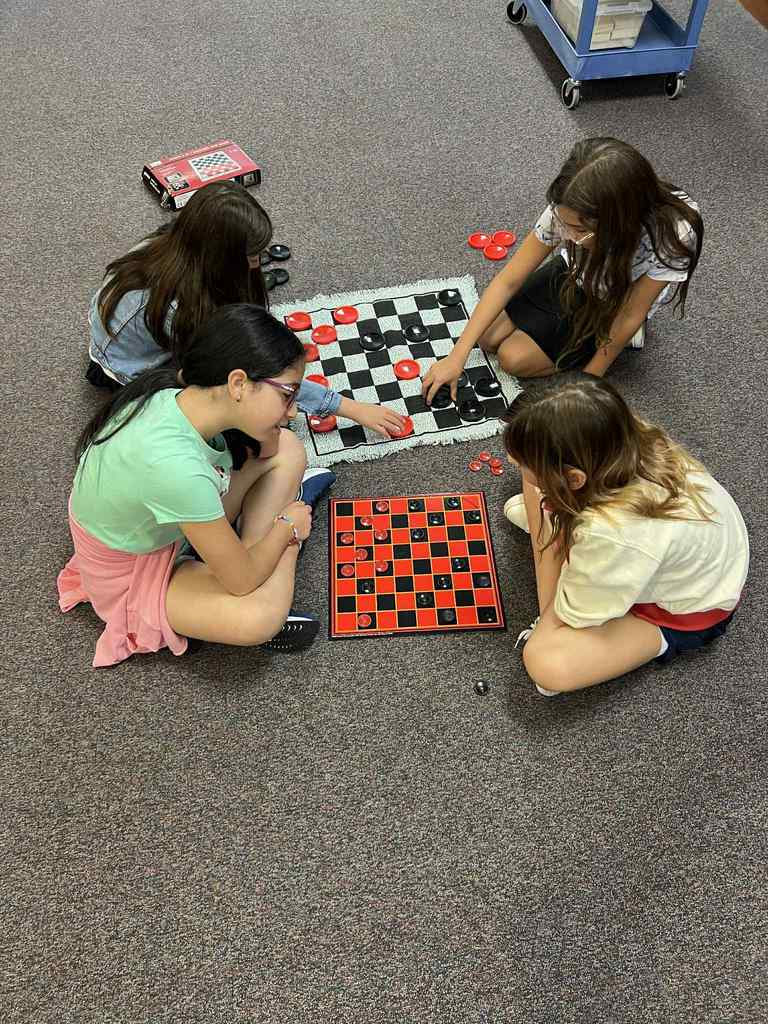 What do you do when it's too hot for Run/Walk ? You do fun teamwork stations inside!