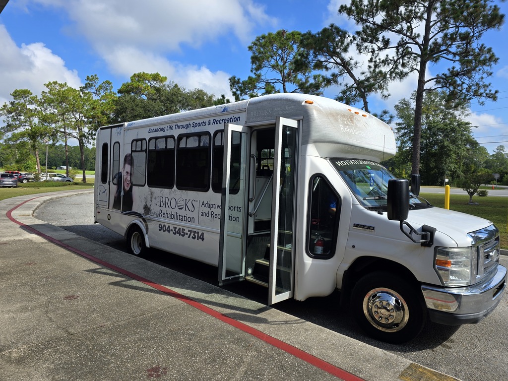 Here comes the bus...ready to drop off school supplies!