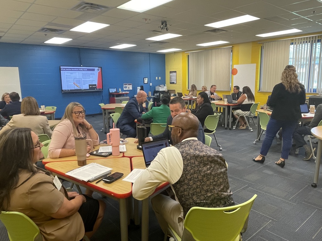 School and district leaders meeting in a breakout session for PD.