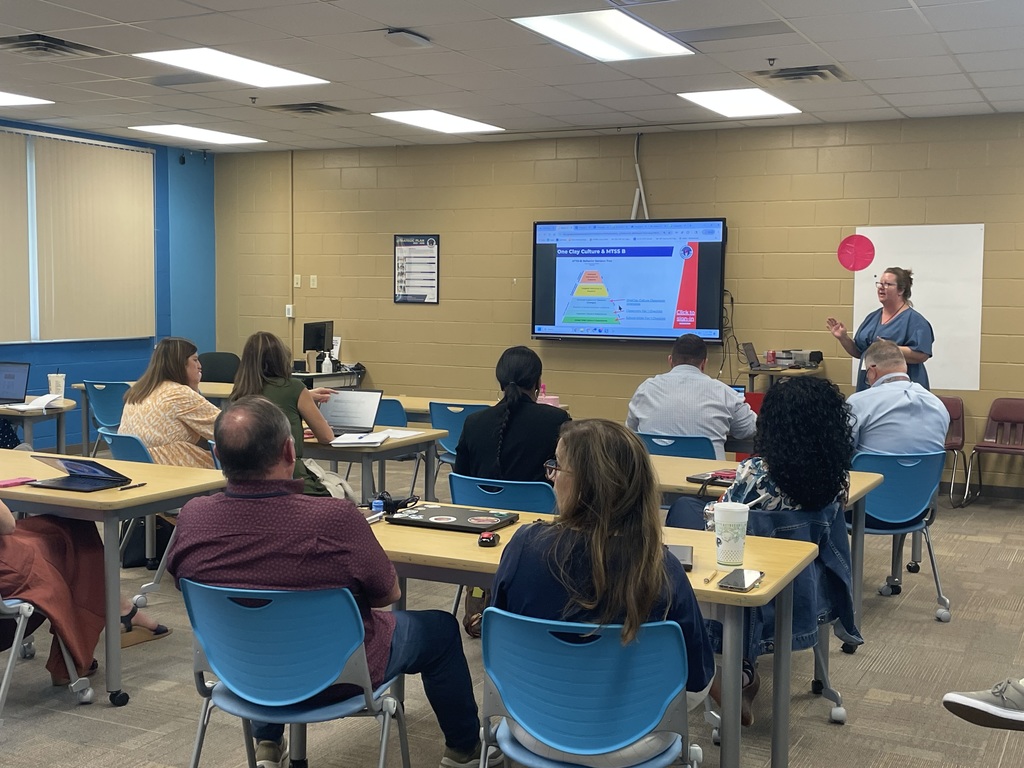 School and district leaders meeting in a breakout session for PD.