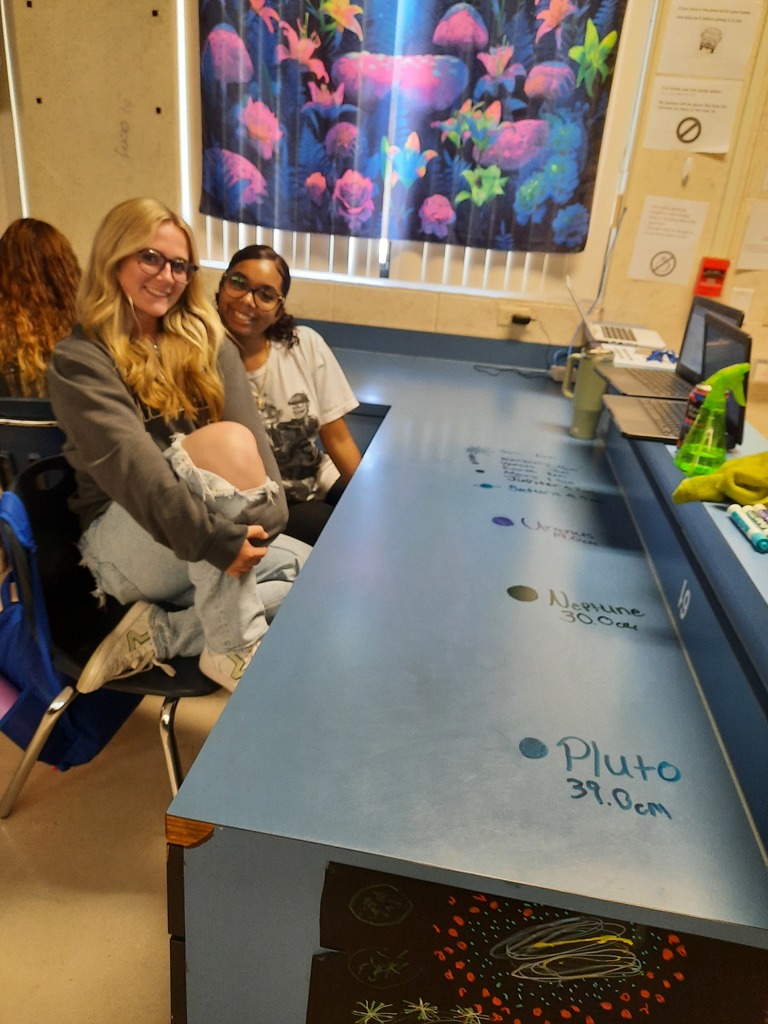 Ms. Klaes’s astronomy students dove into the vastness of space by learning how scientists measure incredible distances across the universe. To bring it to life, they created a scale model of our solar system, where 1 astronomical unit (AU) = 1 cm. Along the way, some of our Panthers had just as much fun in front of the camera as they did with the activity—true stars in every sense! 🌟📸