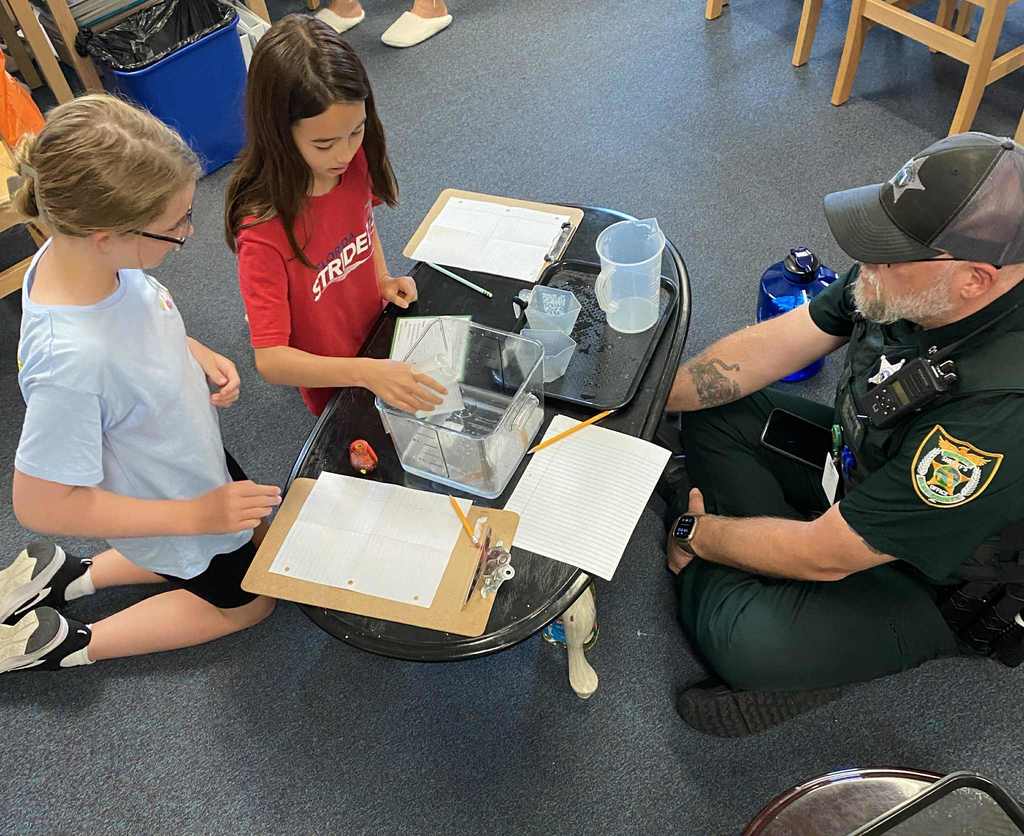Our on-campus temporary Officer, Officer Brundle, has been such an amazing help this week. Our kiddos love the time he has taken to get to know them and grow a connection inside and out of the classroom. Our UE students have enjoyed teaching and even learning from him over the past two days, from how to throw a football to understanding the formation of stars in our universe! We hope the next school he visits will enjoy him just as much as we have!