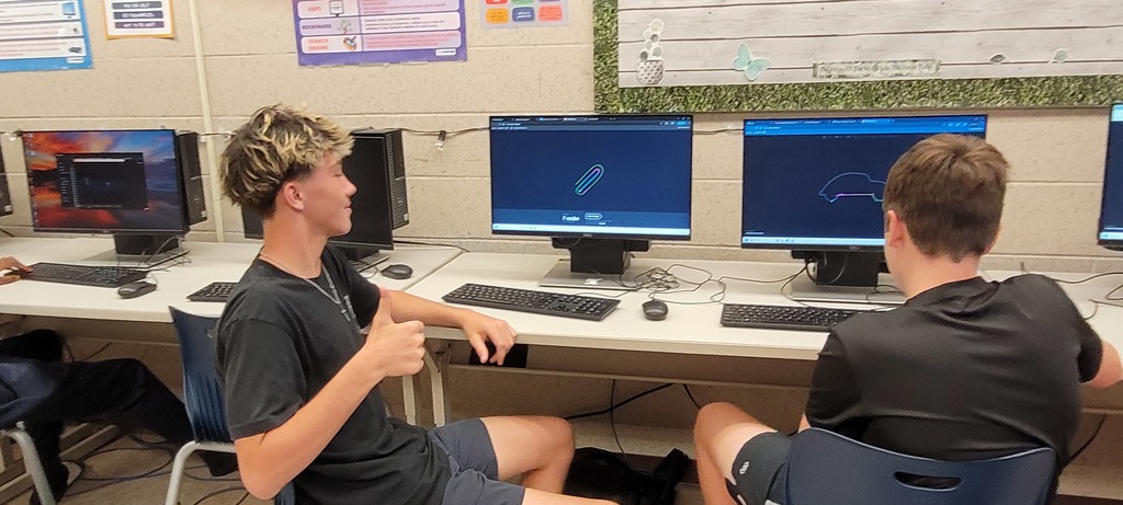 Student completing a puzzle with the pen tool in the Bezier Game
