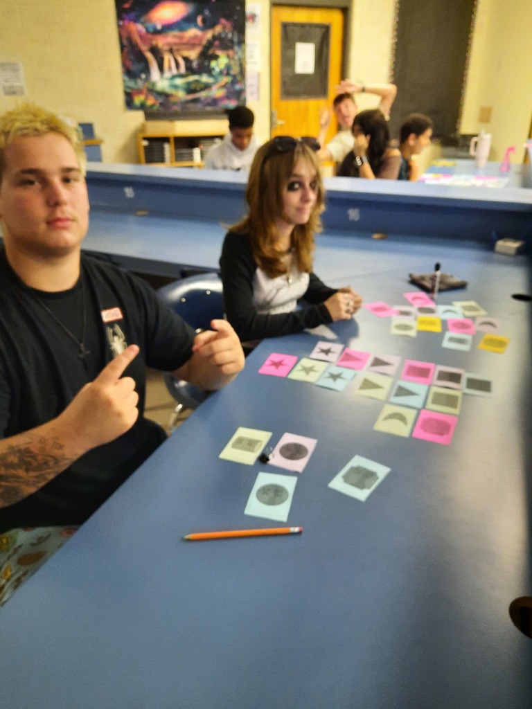 In Ms. Klaes’s astronomy class, students worked collaboratively to solve a puzzle where each card represented a clue through numbers, colors, and shapes. By piecing the clues together, they discovered the arrangement of the periodic table and gained a deeper understanding of how lighter and heavier elements are directly connected to astronomy. This hands-on challenge not only reinforced key science concepts but also pushed students to think critically, problem-solve, and make meaningful connections across disciplines.