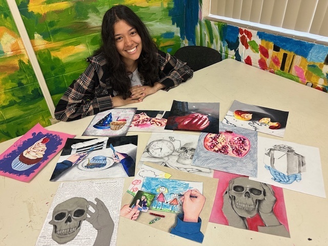 students showcasing their art