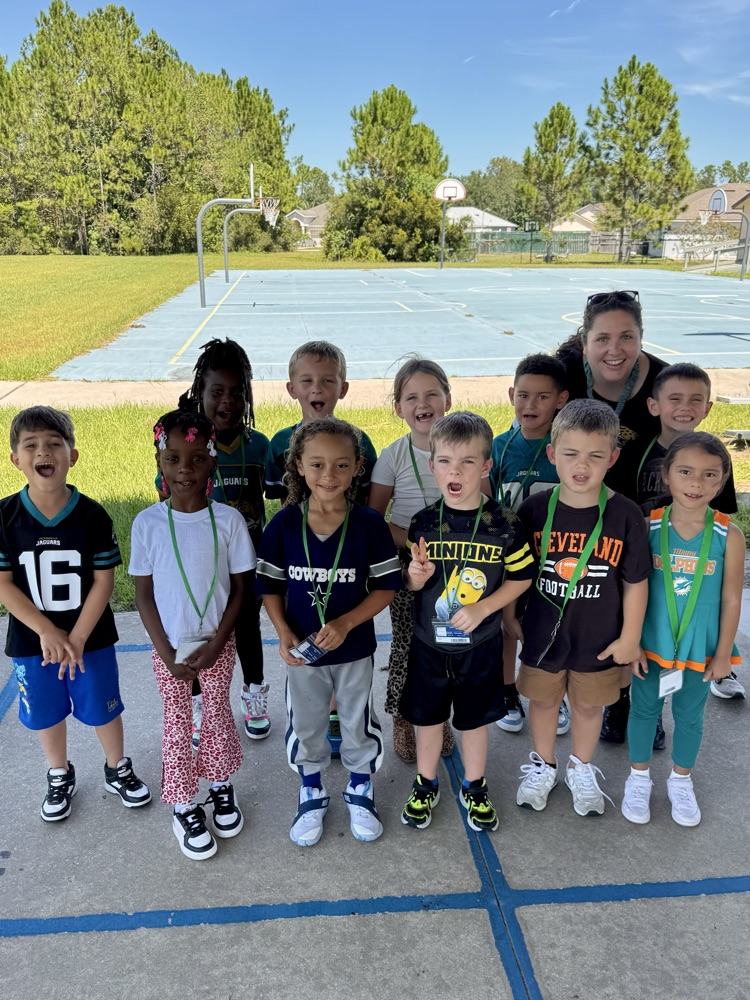 students dressed in NFL gear