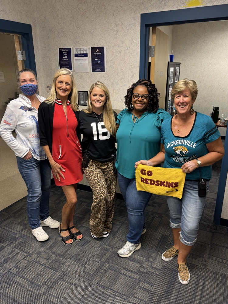 students dressed in NFL gear