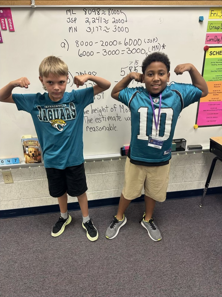 students dressed in NFL gear