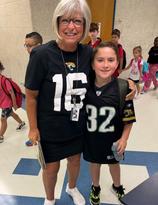 students dressed in NFL gear