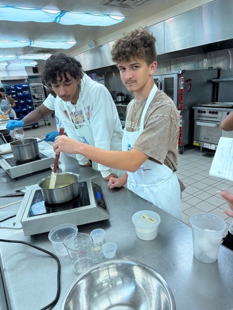 Last week, Ms. LaPierre’s Culinary 2 students showcased their pastry skills by creating delicious cream puffs from scratch! On day one, students prepared a traditional pâte à choux, then returned the next day to make rich pastry cream to fill their puffs. To top it all off, many added a finishing touch of chocolate drizzle for extra flair. A perfect blend of creativity, technique, and teamwork—way to go, Panthers!