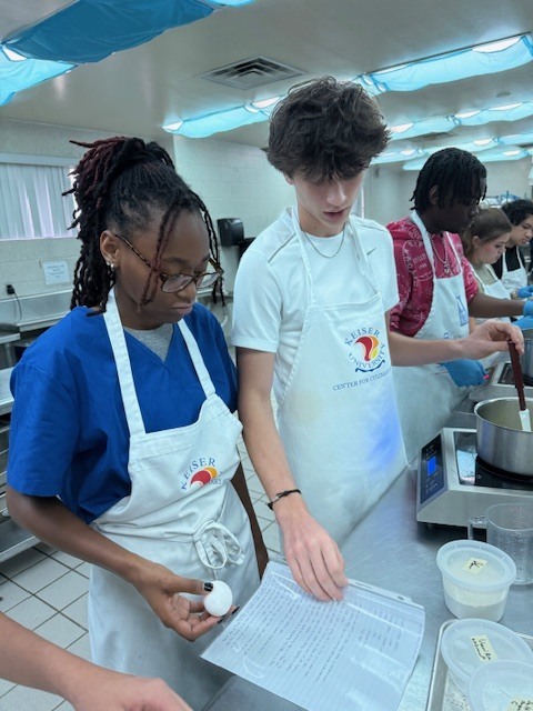 Last week, Ms. LaPierre’s Culinary 2 students showcased their pastry skills by creating delicious cream puffs from scratch! On day one, students prepared a traditional pâte à choux, then returned the next day to make rich pastry cream to fill their puffs. To top it all off, many added a finishing touch of chocolate drizzle for extra flair. A perfect blend of creativity, technique, and teamwork—way to go, Panthers!