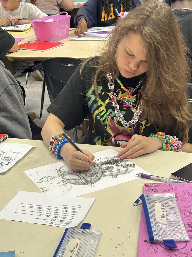 Ms. Generazio’s Art 1 students took their Scary/Spooky Drawing projects to the next level through a carousel critique designed to strengthen artistic vocabulary and peer feedback skills. Each student received a card labeled Best Technique, Most Creative, Favorite Work, or Most Expressive and rotated around the room, leaving thoughtful comments focused on value, shading, and line work.  During the class debrief, Ms. Generazio spotlighted standout pieces, inviting the student artists to share the comments they received from their peers. Together, the class discussed what made feedback specific, detailed, and connected to artistic concepts. Students then completed a self-assessment rubric, reflecting on their craftsmanship and growth as artists.  🖋️ Through this process, students not only refined their techniques—they learned to observe, articulate, and appreciate the creative process in one another’s work.