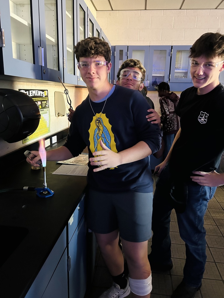 In Ms. Fortner’s Honors and Pre-IB/AICE Chemistry classes, students brought science to life through a flame test lab using Bunsen burners and various metal solutions. When heated, the electrons in each metal moved from their ground state to an excited state, then released energy in the form of vibrant light as they returned to ground state. Each colorful flame revealed a unique spectral signature for the metal ion tested, allowing students to connect abstract atomic theory to real-world observation.