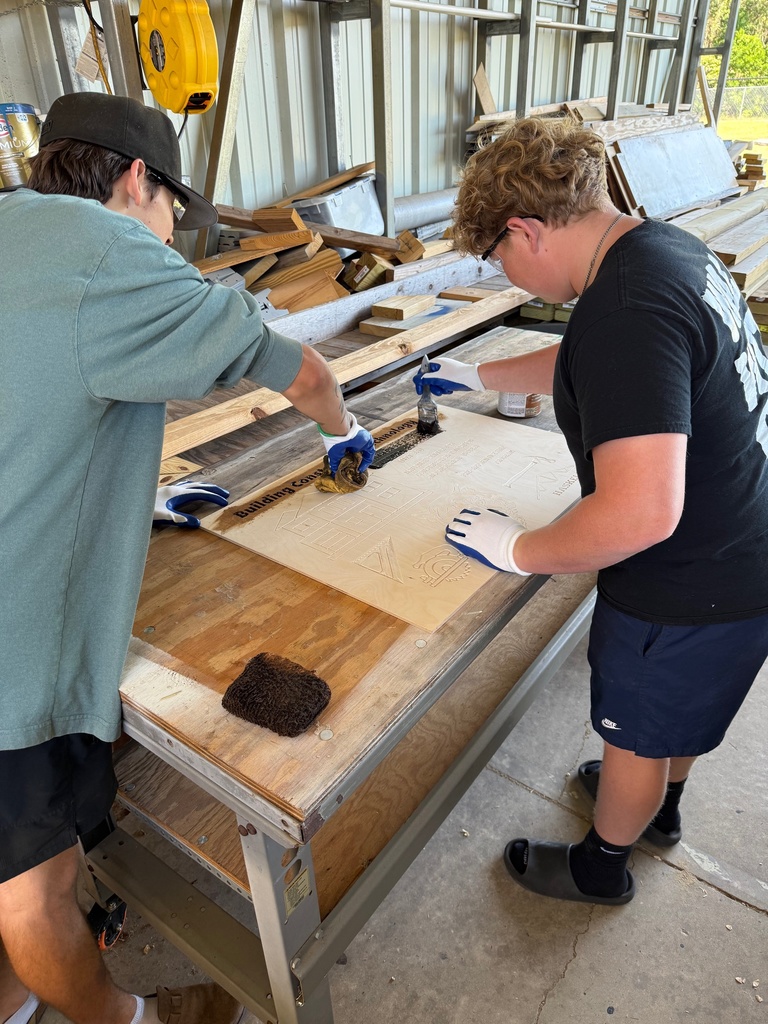 Mr. Bruchak’s upper-level Carpentry students are taking their skills to the next level with the CNC machine, learning to design and create custom wood signs. After experimenting with several approaches, they discovered the best techniques to make letters and objects truly stand out, a great lesson in precision, patience, and problem-solving!    Students have now moved on to the staining phase, adding depth and detail to their work. Next up, they’ll be designing their own personalized signs, applying their craftsmanship and creativity to the fullest.