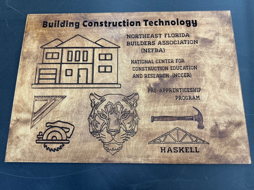 Mr. Bruchak’s upper-level Carpentry students are taking their skills to the next level with the CNC machine, learning to design and create custom wood signs. After experimenting with several approaches, they discovered the best techniques to make letters and objects truly stand out, a great lesson in precision, patience, and problem-solving!    Students have now moved on to the staining phase, adding depth and detail to their work. Next up, they’ll be designing their own personalized signs, applying their craftsmanship and creativity to the fullest.