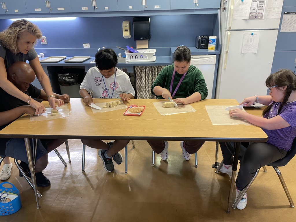 Ms. B.’s Career Prep students put their culinary skills to the test as they practiced slicing rolled cookie dough using safety knives! After perfecting their technique, they decorated their cookies in beautiful fall colors—just in time for the season! 