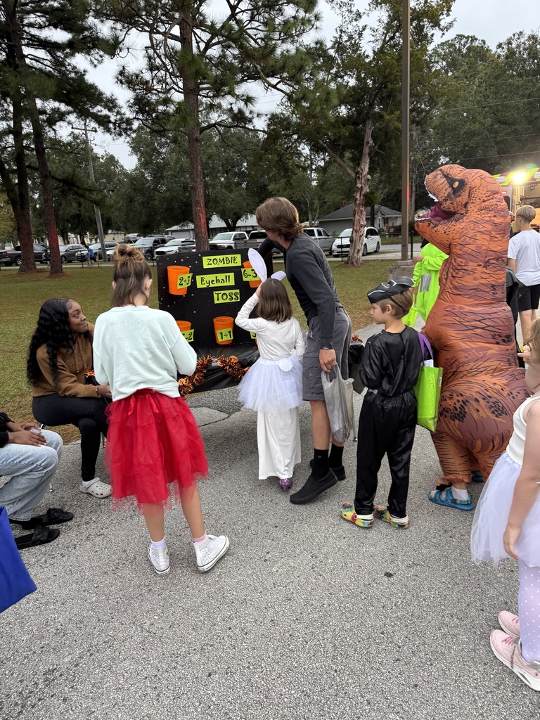 Our amazing Ridgeview students showed up in full force to support Ridgeview Elementary’s “Math Isn’t Scary” Trunk or Treat event! 🧮🍭  Students from various clubs and athletic teams hosted creative trunks filled with treats and Panther spirit, while members of FFEA took it a step further by designing interactive math and literacy games for the elementary students to enjoy. 🎲📚  It was a night full of learning, laughter, and leadership as our Panthers spread joy and showed what it means to give back to our community.