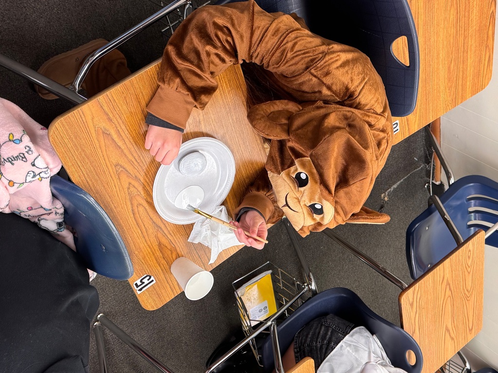 Students in Ms. Marrero’s Spanish 2 and AICE 2 classes celebrated Día de los Muertos by decorating remembrance stones dedicated to loved ones, pets, or admired figures who have passed away. As part of this cultural exploration, students expressed their emotions and described their creative process entirely in Spanish, using familiar vocabulary and new descriptive phrases. Through this experience, they deepened their language skills while connecting the rich traditions, symbols, and meanings of Día de los Muertos to their own lives.