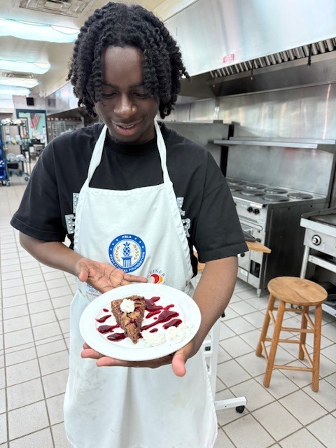 Ms. LaPierre’s Culinary 2 students are refining their plating and presentation skills, turning simple desserts into edible works of art! Students prepared rich brownies topped with a vibrant berry coulis, practicing precision, balance, and design to create visually stunning (and delicious!) plates. Their attention to detail and creativity truly showcase the artistry behind professional culinary presentation. 