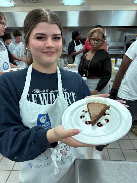 Ms. LaPierre’s Culinary 2 students are refining their plating and presentation skills, turning simple desserts into edible works of art! Students prepared rich brownies topped with a vibrant berry coulis, practicing precision, balance, and design to create visually stunning (and delicious!) plates. Their attention to detail and creativity truly showcase the artistry behind professional culinary presentation. 