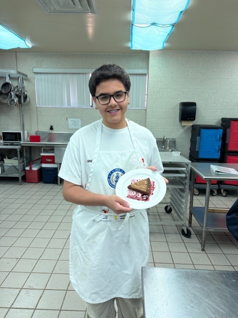 Ms. LaPierre’s Culinary 2 students are refining their plating and presentation skills, turning simple desserts into edible works of art! Students prepared rich brownies topped with a vibrant berry coulis, practicing precision, balance, and design to create visually stunning (and delicious!) plates. Their attention to detail and creativity truly showcase the artistry behind professional culinary presentation. 