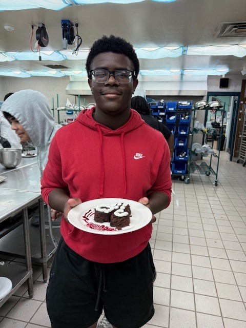 Ms. LaPierre’s Culinary 2 students are refining their plating and presentation skills, turning simple desserts into edible works of art! Students prepared rich brownies topped with a vibrant berry coulis, practicing precision, balance, and design to create visually stunning (and delicious!) plates. Their attention to detail and creativity truly showcase the artistry behind professional culinary presentation. 