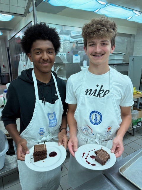 Ms. LaPierre’s Culinary 2 students are refining their plating and presentation skills, turning simple desserts into edible works of art! Students prepared rich brownies topped with a vibrant berry coulis, practicing precision, balance, and design to create visually stunning (and delicious!) plates. Their attention to detail and creativity truly showcase the artistry behind professional culinary presentation. 