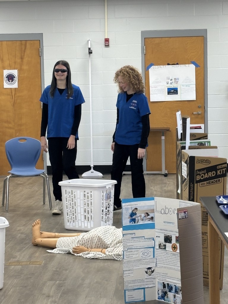 Ms. Colón's Health Science Foundations students recently completed an in-depth unit on effective patient-healthcare professional communication, focusing on giving/receiving clear instructions and recognizing common barriers. To apply these concepts, students engaged in a hands-on lab in which they alternated between the roles of a visually impaired patient (wearing blackout goggles) and a CNA, guiding the "patient" through an obstacle course. This immersive experience highlighted the critical value of clear, concise communication from both perspectives, fostering more profound empathy by allowing students to step into the patient's role for a moment, and concluded with a debriefing session to share their insights.