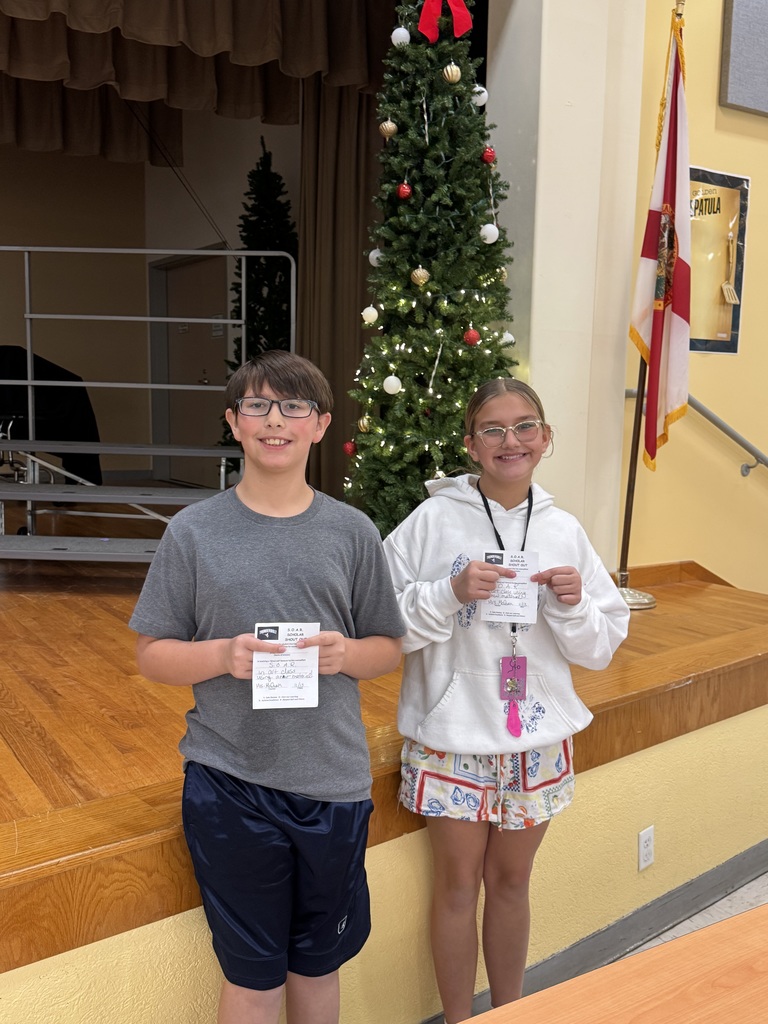 Students holding SOAR Award