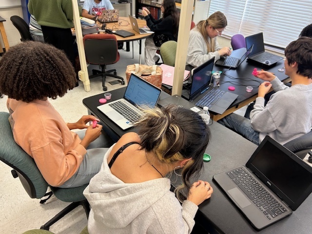 our IB Senior History students brought their Move to Global War unit to life through a hands-on “Domino Effect” Play-Doh activity to conclude their Paper 1 review. Working in collaborative groups, students created a chain of interconnected Play-Doh sculptures representing key events such as the Rhineland, Anschluss, Sudetenland, and the invasion of Poland. Each sculpture symbolized a historical decision or reaction. When the first piece was knocked over, students watched the entire chain reaction unfold, visually demonstrating how aggression and appeasement led to World War II. Students then analyzed which event served as the tipping point. They debated how different international responses may have altered history, reinforcing key TOK concepts of historical evidence, interpretation, and cause-and-effect. A powerful example of creative, critical IB learning in action!