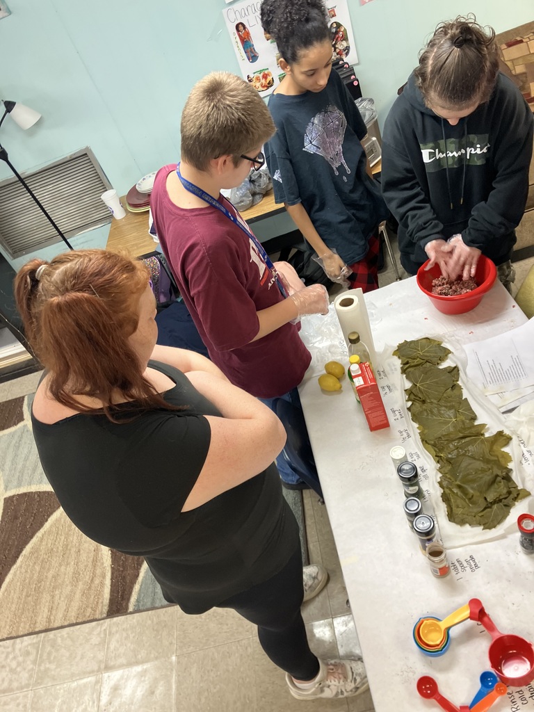 In Ms. Yancey’s World History class, Ms. Brown led students in the hands-on production of stuffed grape leaves as part of their study of Mediterranean regions, including the Fertile Crescent in Mesopotamia and Egypt. Students explored culture, geography, and history through food. At first, they treated the grape leaves like green eggs and ham, convinced they wouldn’t like them, but after the first bite, everyone was cheering, and many went back for seconds and thirds.