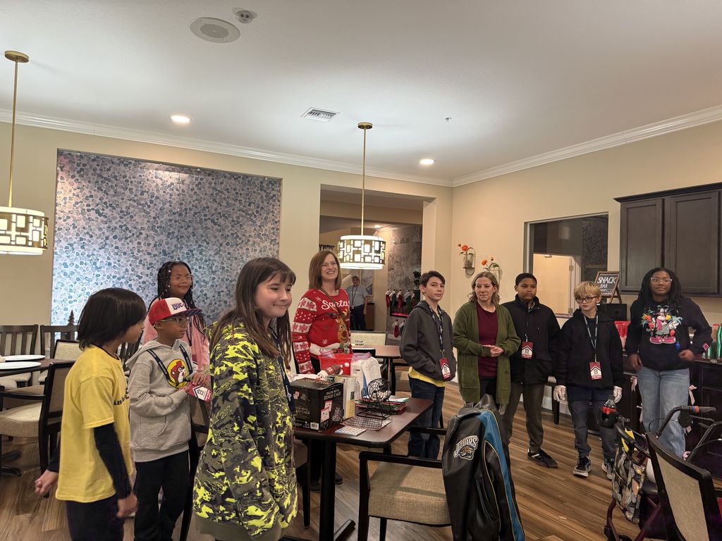 On December 15th, the Anchored 4 Life club provided a Christmas Party for the residents at Silver Treasures at Fleming Island. A lot of fun was had by all with refreshments, bingo, Minute to Win It games, and homemade cards. Thank you to the parents who came and helped also.