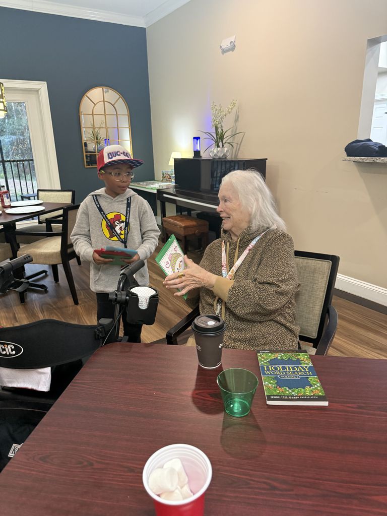 On December 15th, the Anchored 4 Life club provided a Christmas Party for the residents at Silver Treasures at Fleming Island. A lot of fun was had by all with refreshments, bingo, Minute to Win It games, and homemade cards. Thank you to the parents who came and helped also.