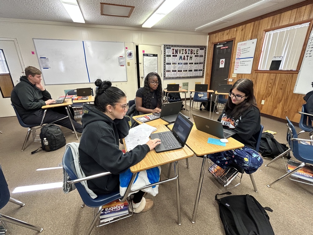 Ms. Charles’s Algebra II students were actively engaged in learning how to graph parabolas and quadratic equations, using strategies designed to help them efficiently tackle SAT-style questions. Through visual models and guided practice, students strengthened their understanding of how equations translate to graphs.  A highlight of the lesson was seeing a student step into a leadership role by explaining the math and reasoning behind the graphs to AP Williams, demonstrating both confidence and deep understanding.  Great examples of rigorous instruction, student ownership, and meaningful math discourse at Ridgeview! 🐾📐