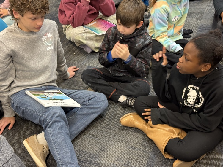 LAJ students read to LAE students. 