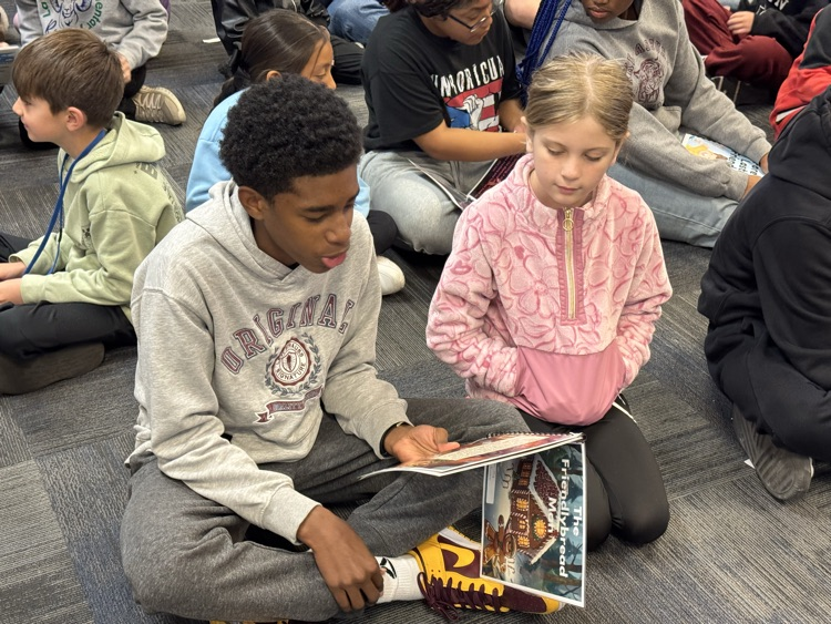 LAJ students read to LAE students. 