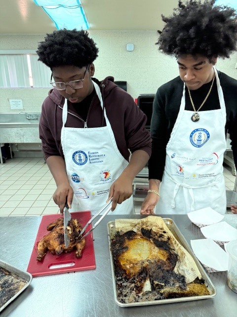 Ms. LaPierre’s Culinary 2 students turned the kitchen into a hands-on learning lab as they sharpened their roasting and sautéing skills. Students selected a roasted chicken recipe, expertly coated and prepped their chicken, and applied the same techniques to fresh vegetables for sautéing. As the kitchen filled with great aromas, students roasted their chicken and sautéed their vegetables to perfection. The experience concluded with students proudly enjoying the delicious meal they had created.