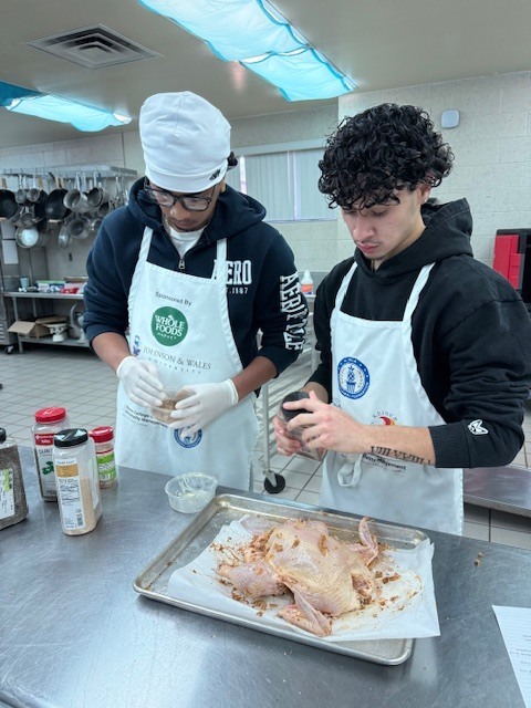Ms. LaPierre’s Culinary 2 students turned the kitchen into a hands-on learning lab as they sharpened their roasting and sautéing skills. Students selected a roasted chicken recipe, expertly coated and prepped their chicken, and applied the same techniques to fresh vegetables for sautéing. As the kitchen filled with great aromas, students roasted their chicken and sautéed their vegetables to perfection. The experience concluded with students proudly enjoying the delicious meal they had created.