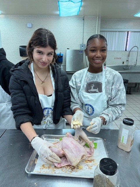 Ms. LaPierre’s Culinary 2 students turned the kitchen into a hands-on learning lab as they sharpened their roasting and sautéing skills. Students selected a roasted chicken recipe, expertly coated and prepped their chicken, and applied the same techniques to fresh vegetables for sautéing. As the kitchen filled with great aromas, students roasted their chicken and sautéed their vegetables to perfection. The experience concluded with students proudly enjoying the delicious meal they had created.