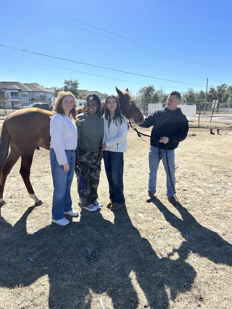 Students in Ms. Ryan’s class experienced psychology in action as they interacted with a horse and trainer to explore classical and operant conditioning. Through this hands-on learning, students observed how classical conditioning uses cues, such as a clicking sound paired with pressure, to help an animal learn a behavior. In contrast, operant conditioning relies on rewards and consequences to shape actions over time. This real-world experience connected to our AICE Psychology curriculum, including the Fagan elephant study, and helped students see how learning theories apply beyond the classroom in meaningful and memorable ways.